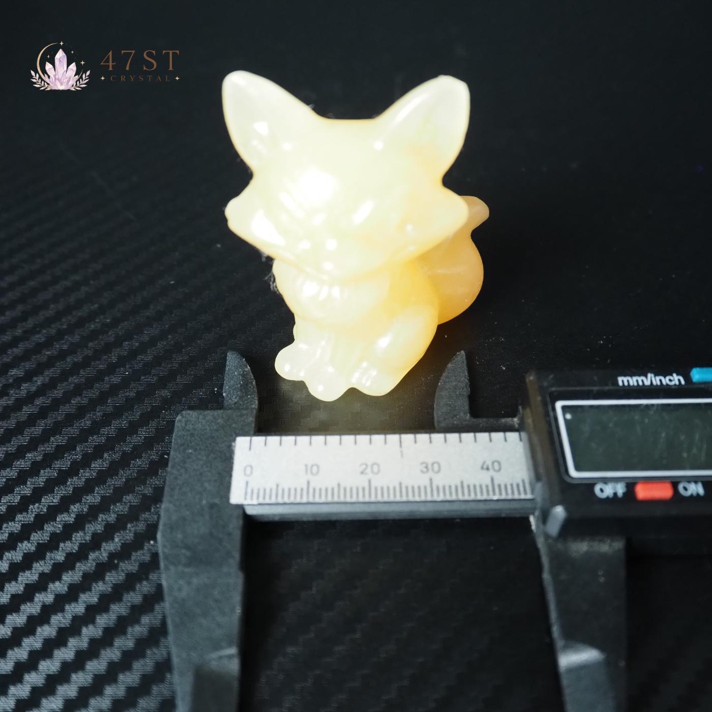 Orange Calcite Fox Carving