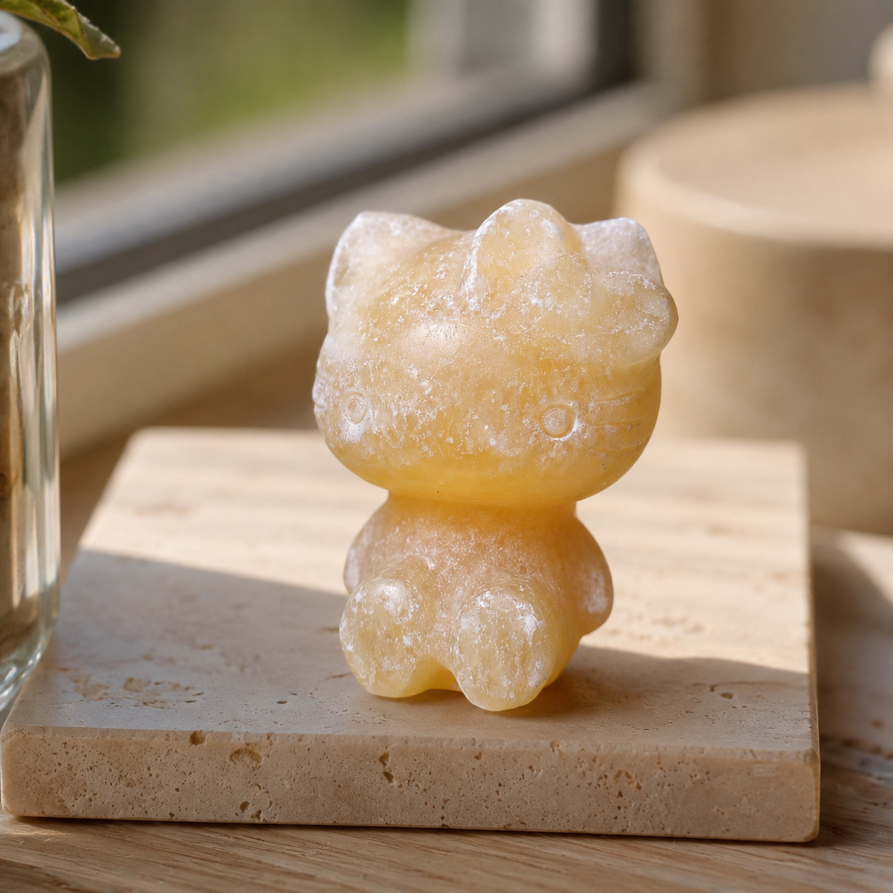 Orange Calcite Hello Kitty Carving