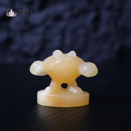 Orange Calcite Poliwhirl Carving