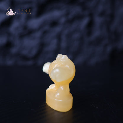 Orange Calcite Poliwhirl Carving