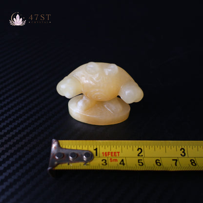 Orange Calcite Poliwhirl Carving