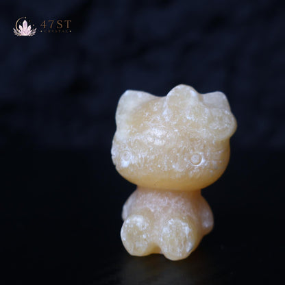 Orange Calcite Hello Kitty Carving
