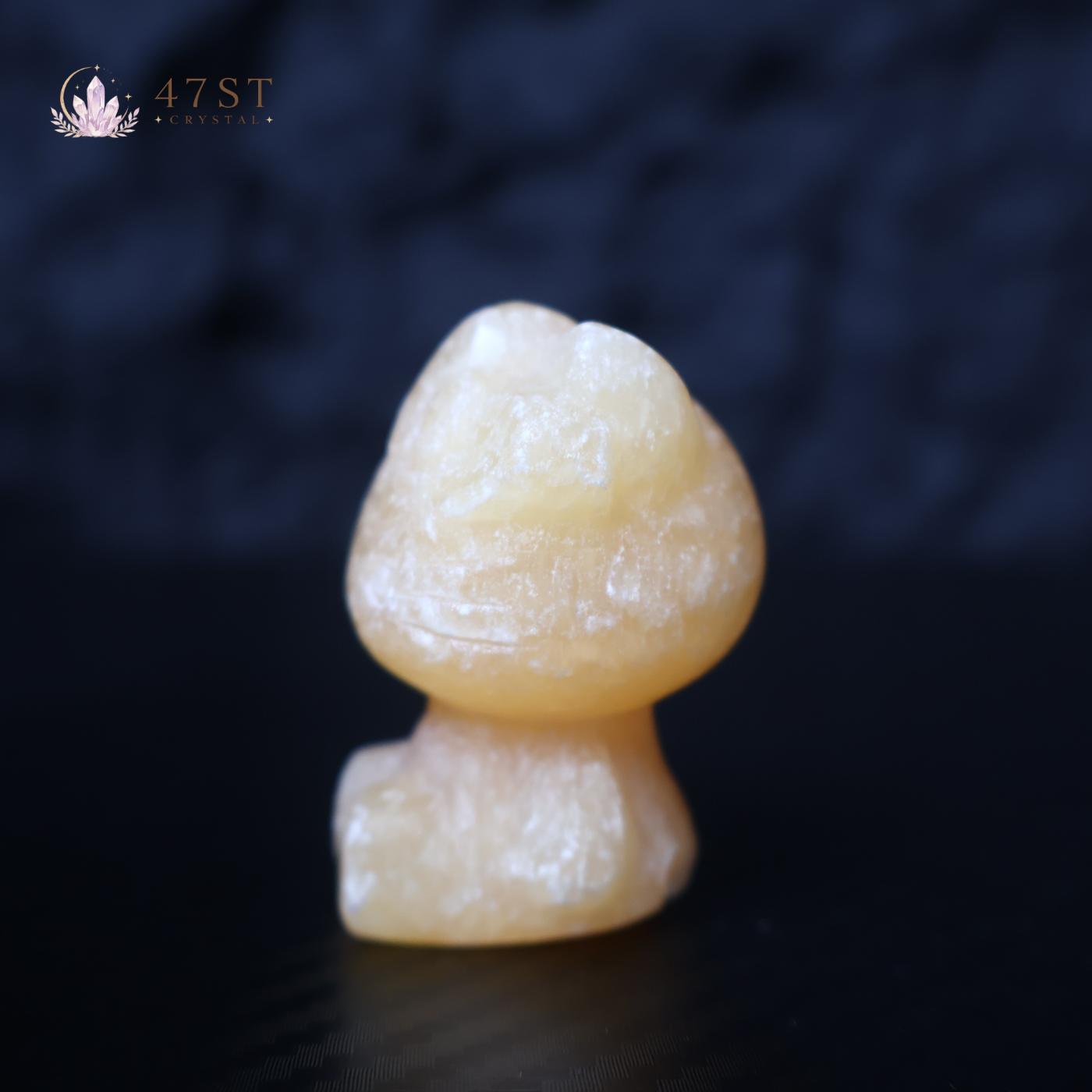 Orange Calcite Hello Kitty Carving