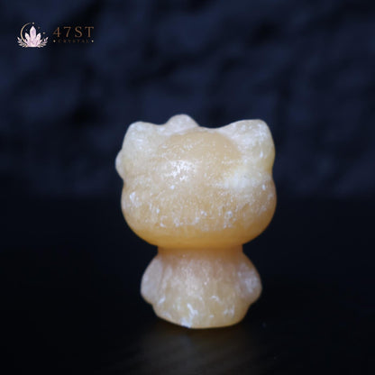Orange Calcite Hello Kitty Carving