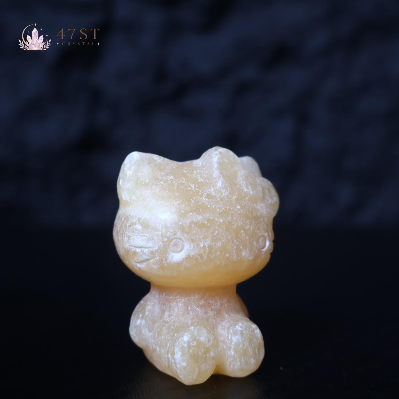 Orange Calcite Hello Kitty Carving