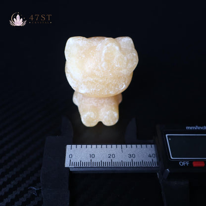 Orange Calcite Hello Kitty Carving