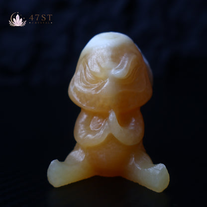 Orange Calcite Yoda Carving