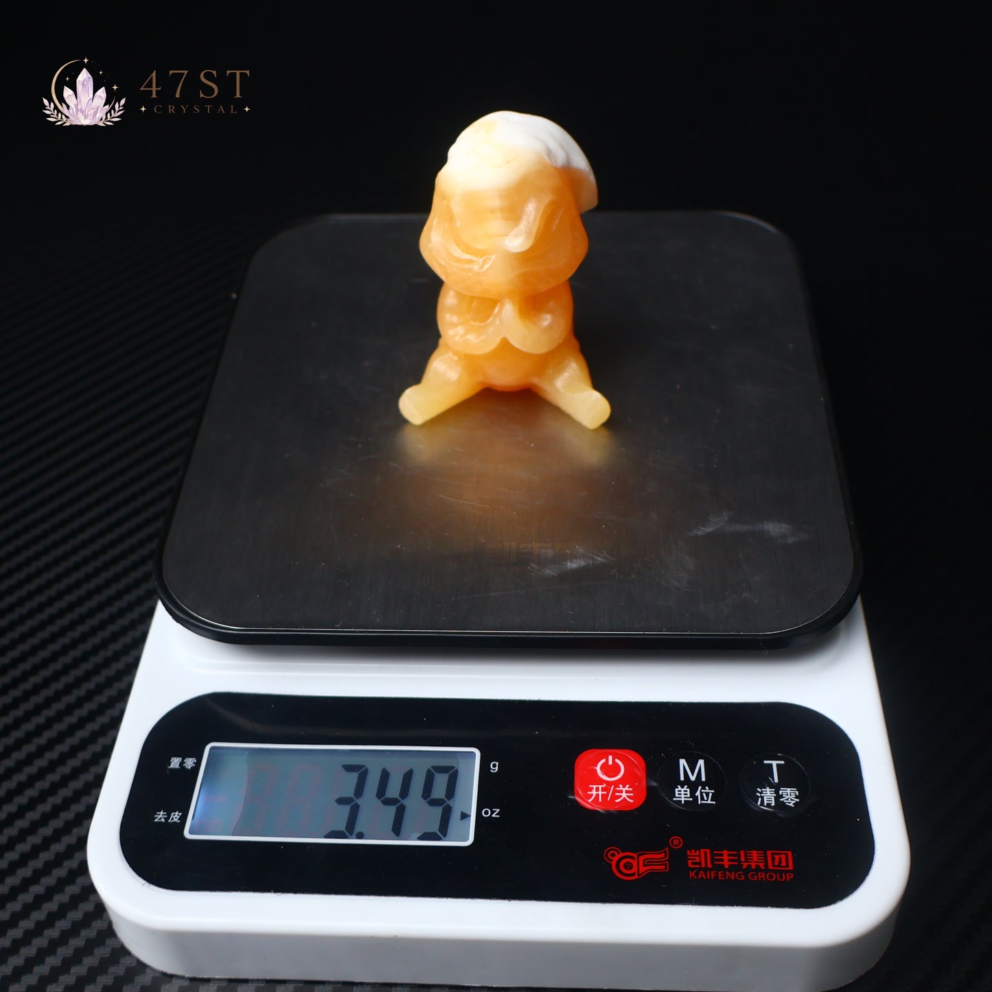 Orange Calcite Yoda Carving
