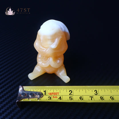 Orange Calcite Yoda Carving