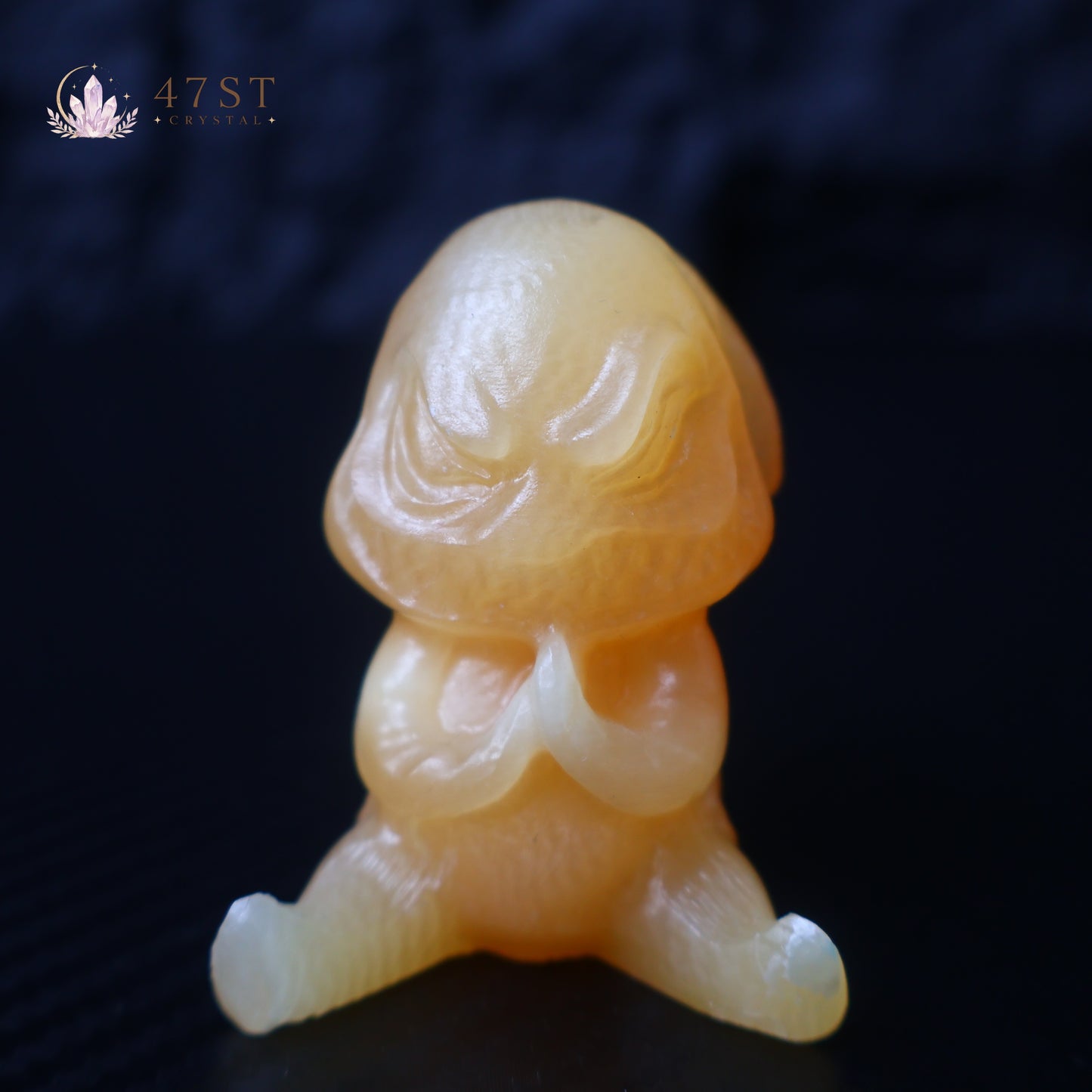 Orange Calcite Yoda Carving