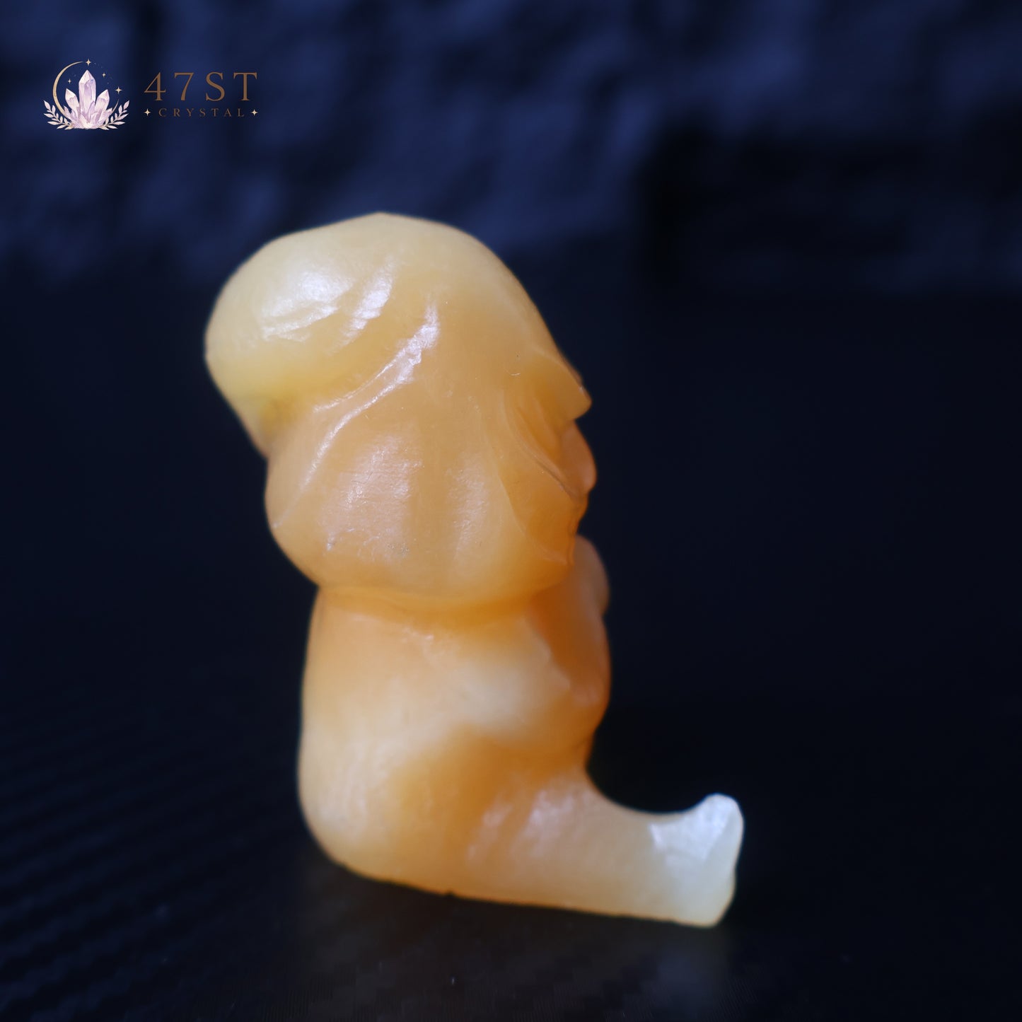 Orange Calcite Yoda Carving