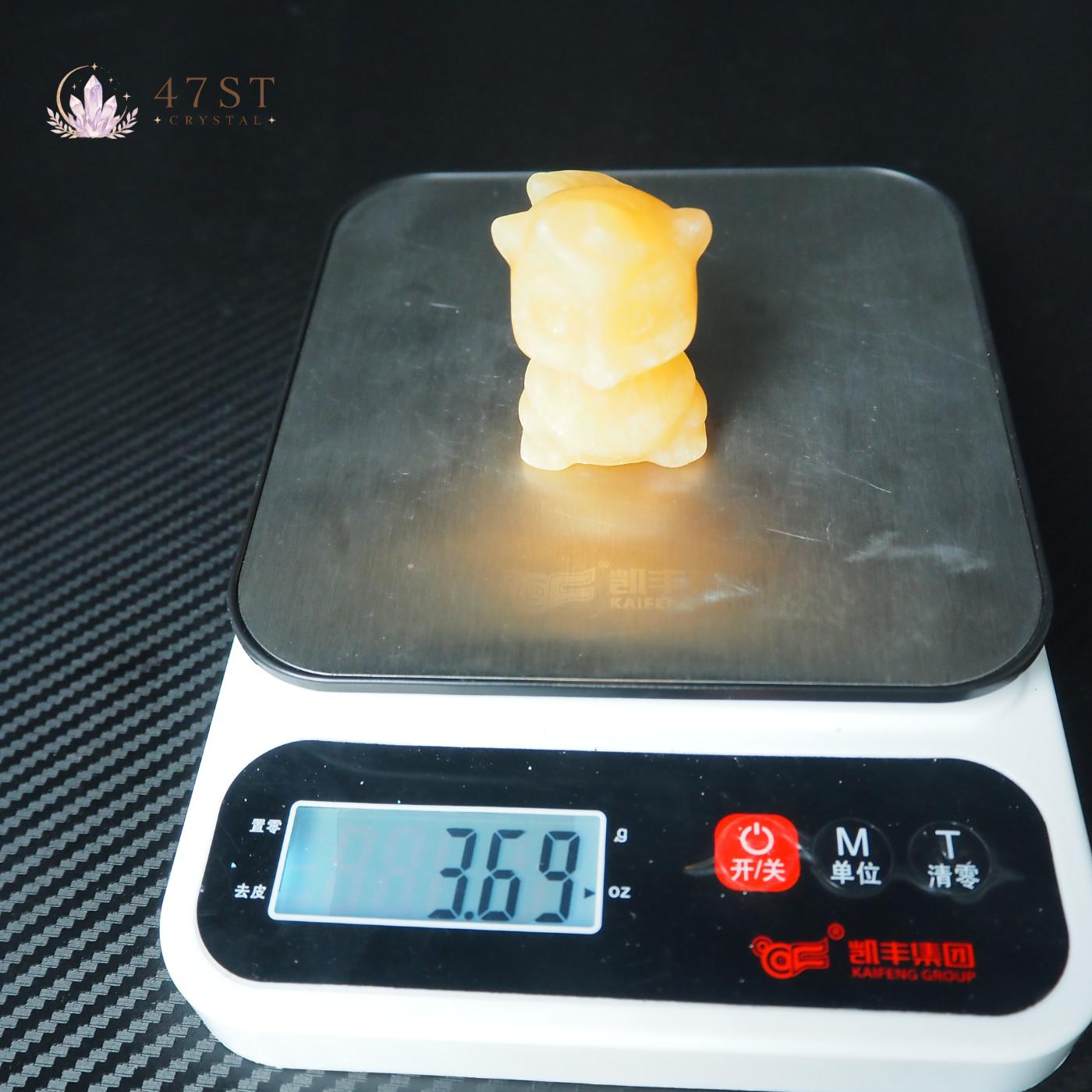 Orange Calcite Squirrel Carving
