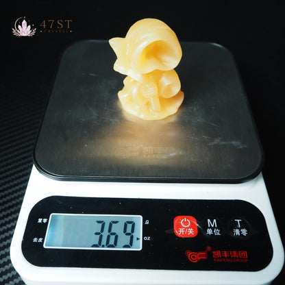Orange Calcite Grim Reaper Carving