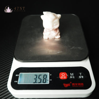 Pink Plum Blossom Jasper Squirrel Carving