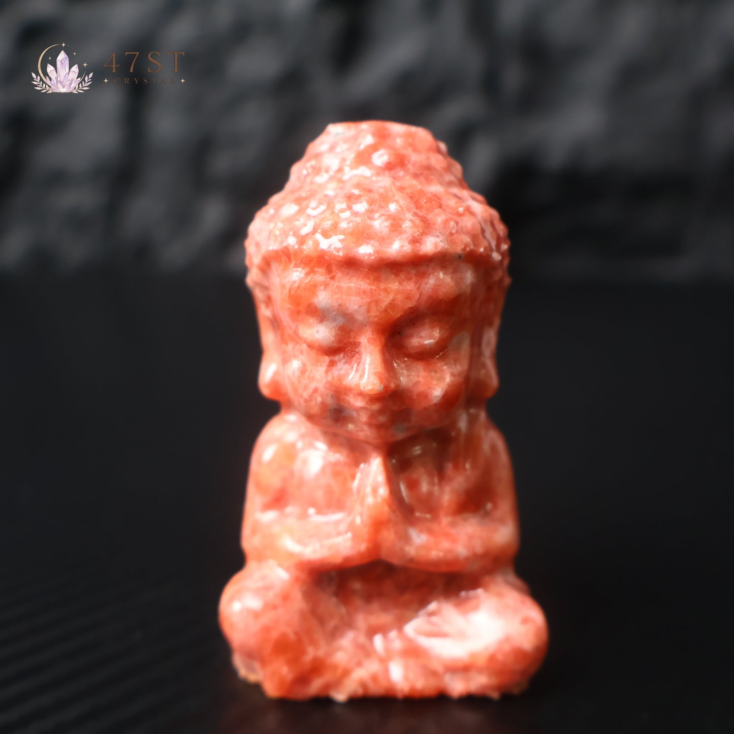Red Calcite Buddha Carving