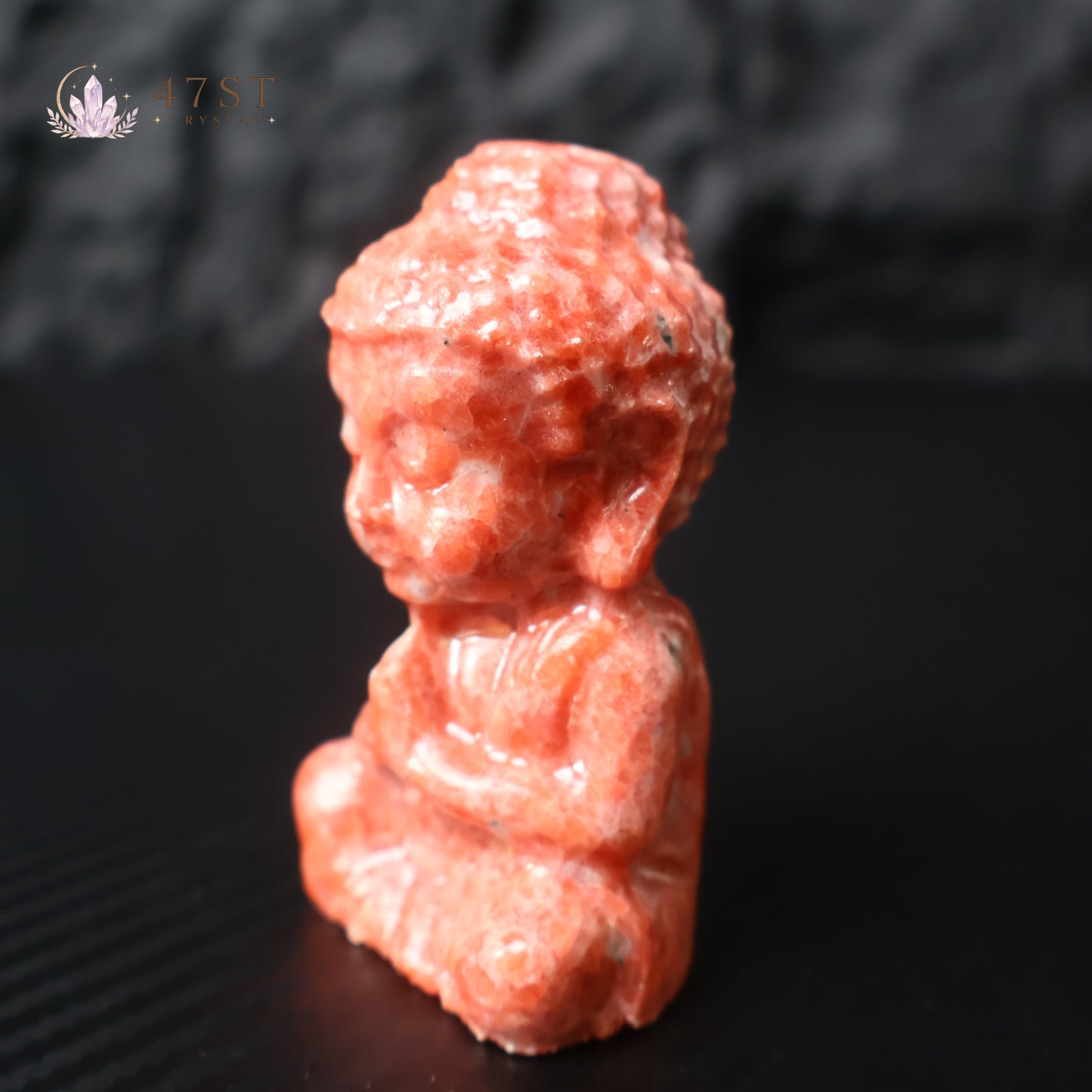 Red Calcite Buddha Carving
