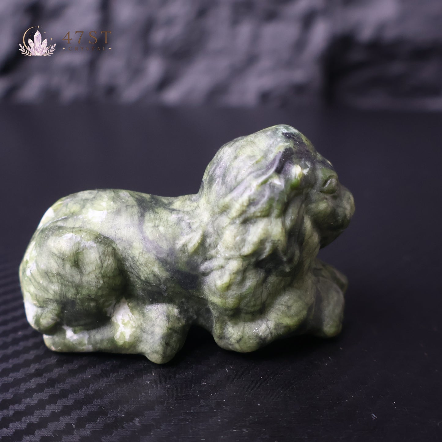 Serpentine Lion Carving