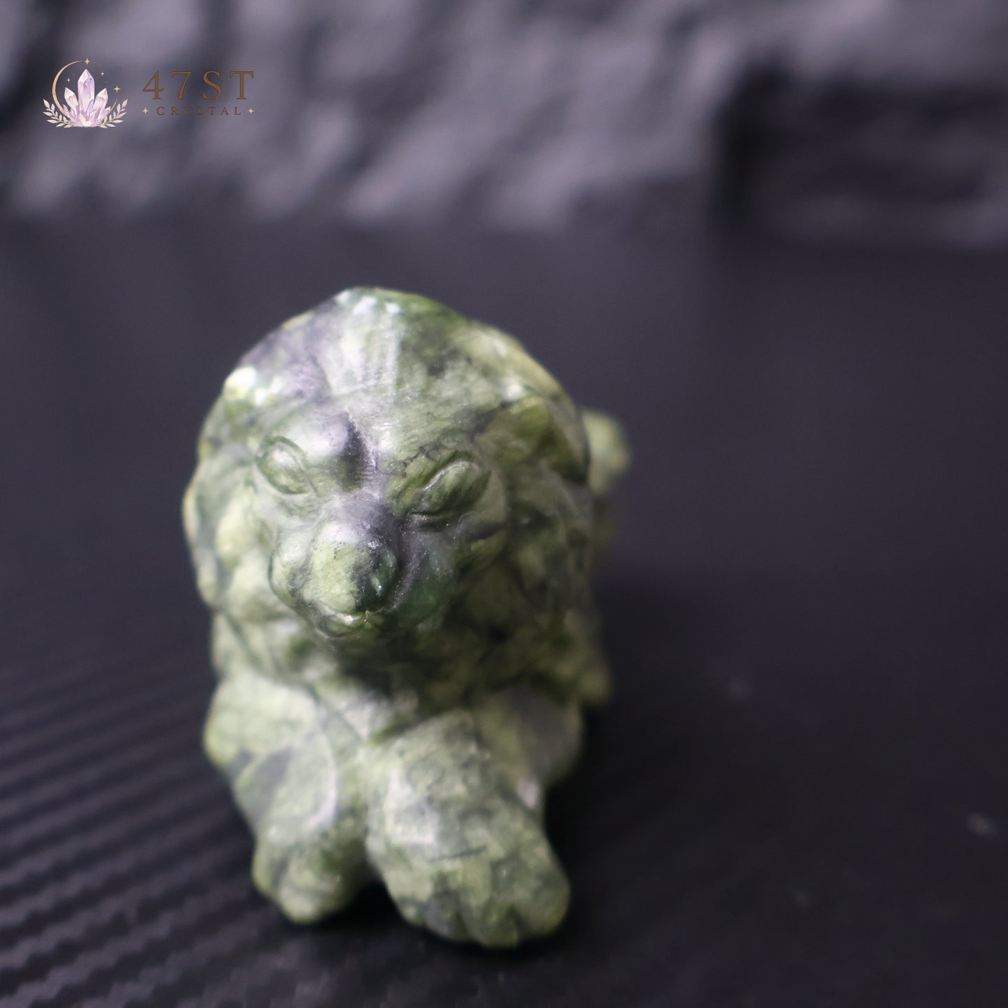 Serpentine Lion Carving
