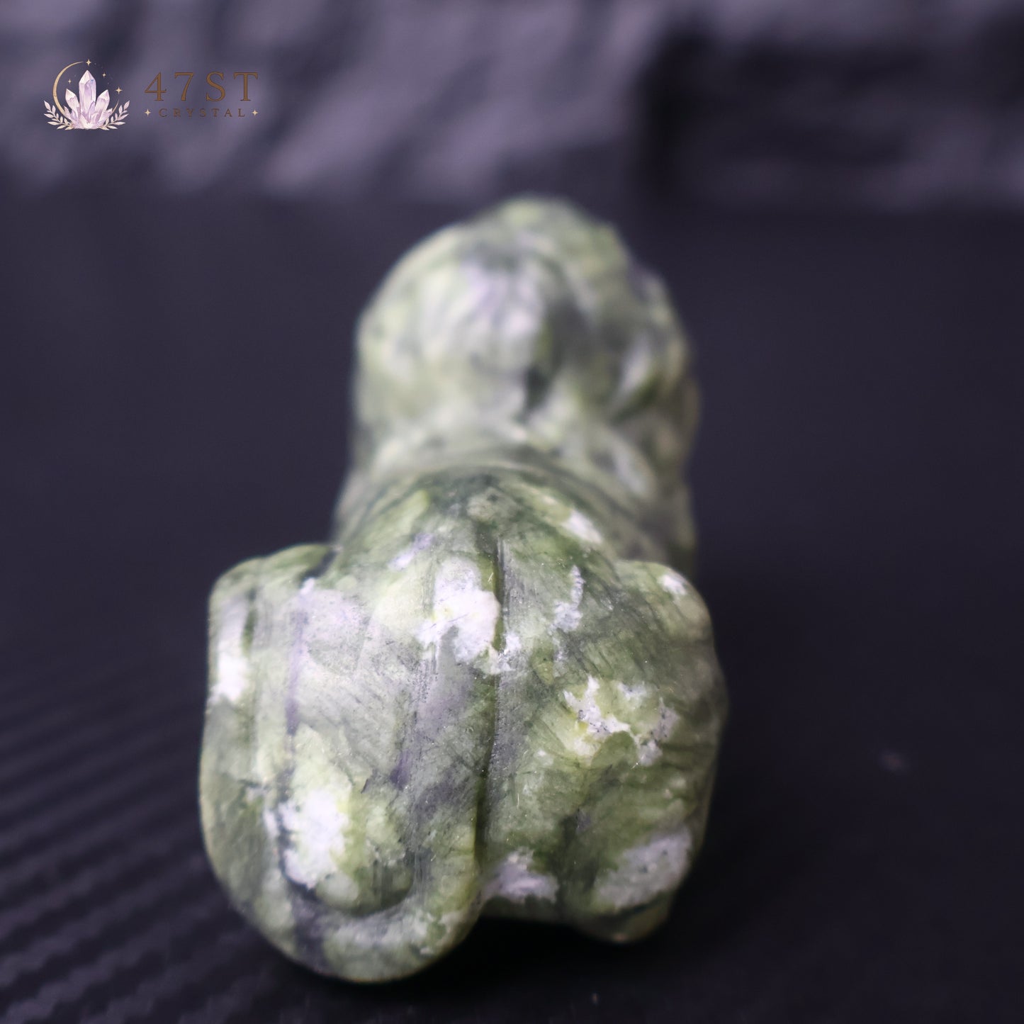 Serpentine Lion Carving